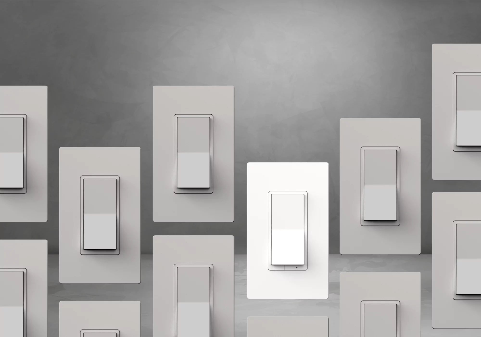 Multiple toggle wall switches with one bright white ALLY smart dimmer in the center illustrating its discreet design