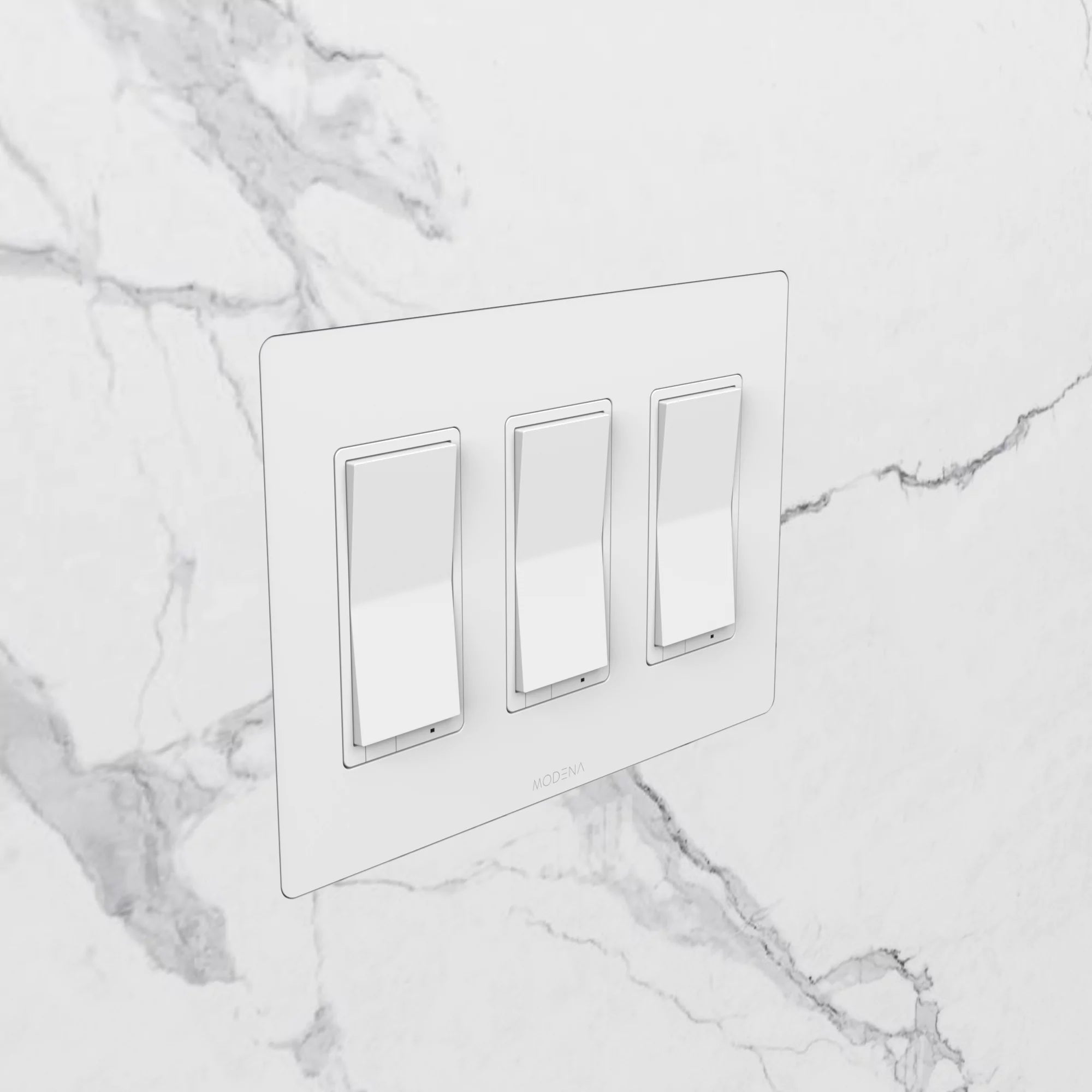 Angle view of CONCEAL 3-gang flush mount system for Decora switches and outlets installed in solid surface