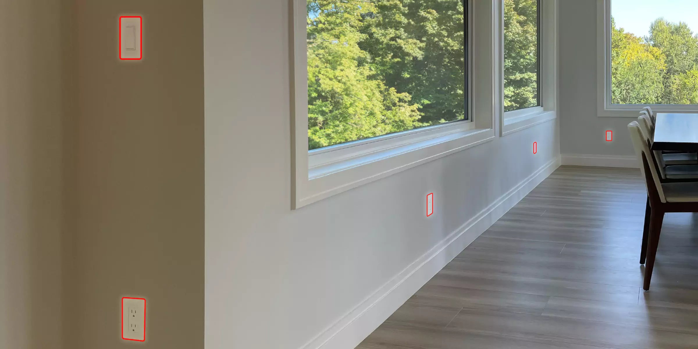 Modern dining room with large windows with CONCEAL flush-mounted switches & outlets highlighted