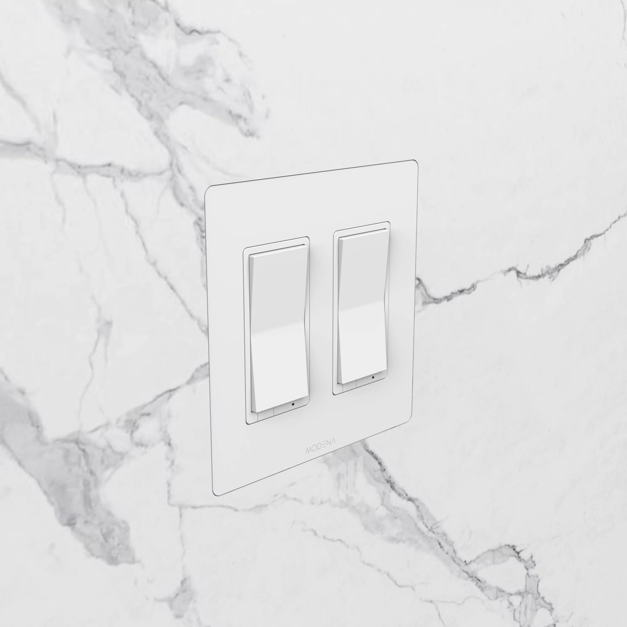 Angle view of CONCEAL 2-gang flush mount system for Decora switches and outlets installed in solid surface