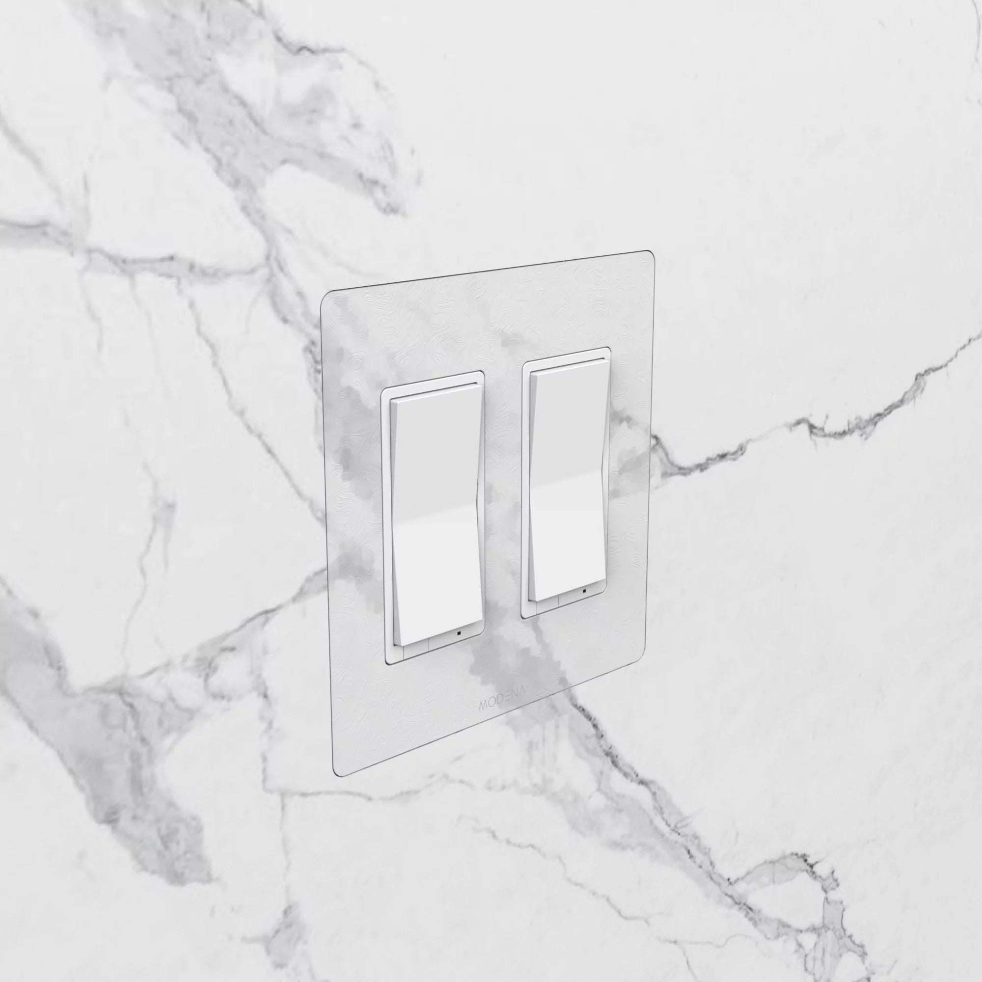 Angle view of CONCEAL 2-gang flush mount system for Decora switches and outlets installed in solid surface and faux finished