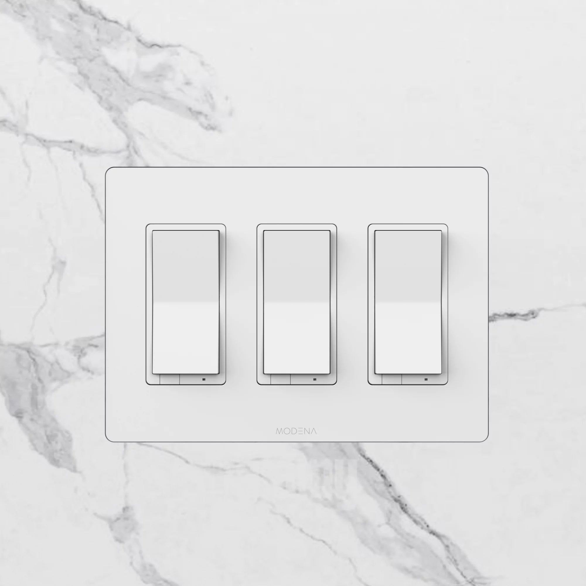 Front view of CONCEAL 3-gang flush mount system for Decora switches and outlets installed in solid surface
